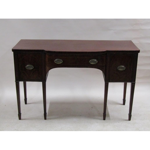 248 - A late Georgian mahogany sideboard with a central bow front drawer flanked by two deep drawers, supp... 