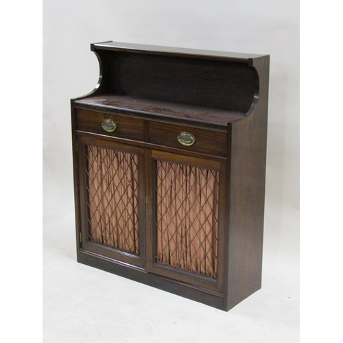 263 - A late Georgian rosewood chiffonier fitted two frieze drawers  under an upper shelf and backboard wi... 