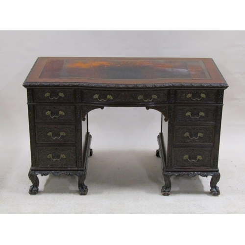 264 - A late 19c/early 20c mid Georgian style mahogany  Maple & Co kneehole desk fitted one bow front frie... 