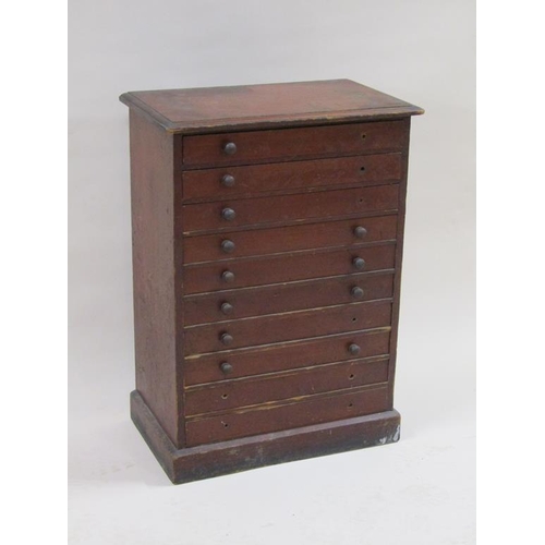 265 - A 19c mahogany collectors cabinet of ten long drawers, containing a collection of miscellaneous butt... 