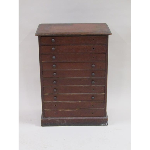 265 - A 19c mahogany collectors cabinet of ten long drawers, containing a collection of miscellaneous butt... 