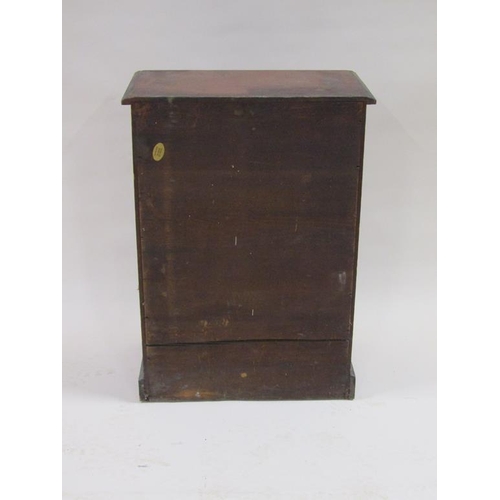 265 - A 19c mahogany collectors cabinet of ten long drawers, containing a collection of miscellaneous butt... 