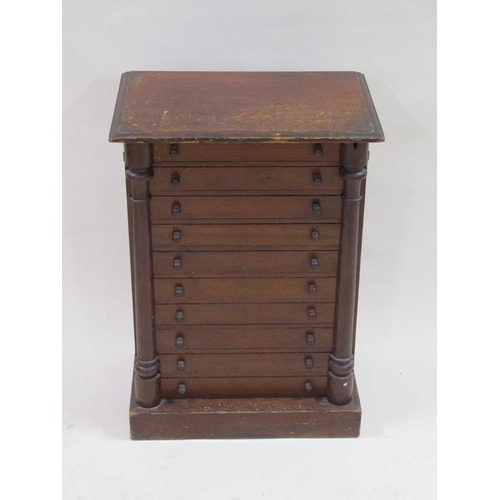 266 - A 19c mahogany collectors cabinet of ten long drawers and split column locking bars, containing a co... 