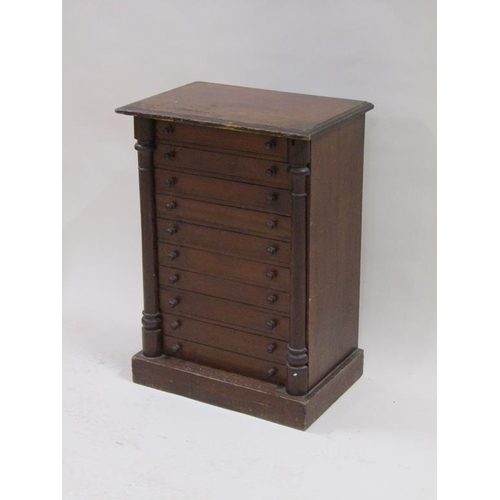 266 - A 19c mahogany collectors cabinet of ten long drawers and split column locking bars, containing a co... 