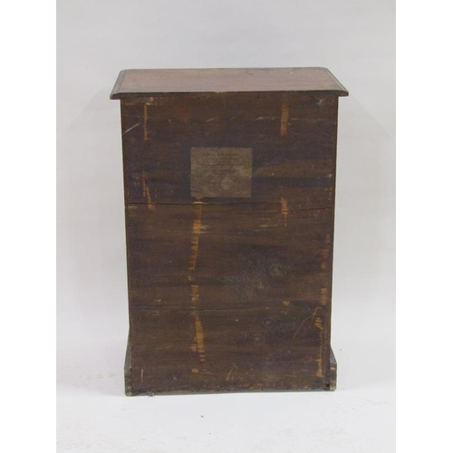 266 - A 19c mahogany collectors cabinet of ten long drawers and split column locking bars, containing a co... 