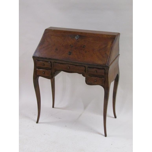 271 - A 19c walnut marquetry bureau de dame with fall front and fitted interior over one central kneehole ... 