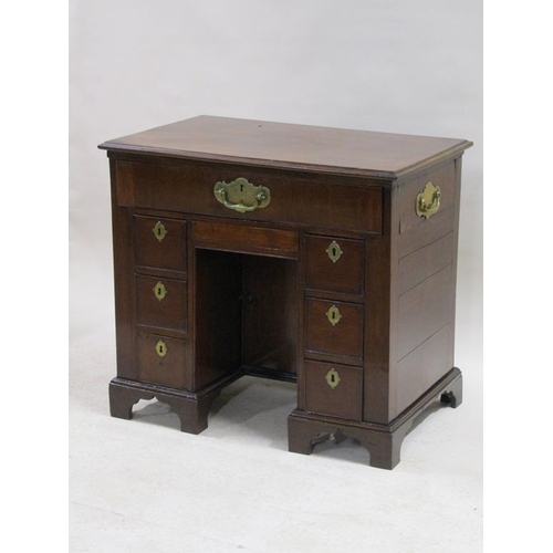 272 - A George III figured mahogany campaign pedestal chest, fitted one long frieze drawer on pedestals, e... 