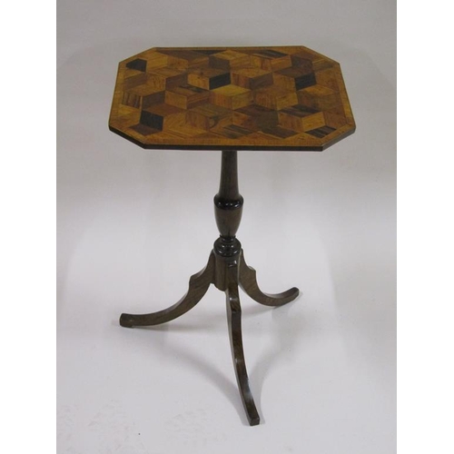 284 - An early 19c tilt top pedestal tripod table with an octagonal cube work table top supported on a ros... 