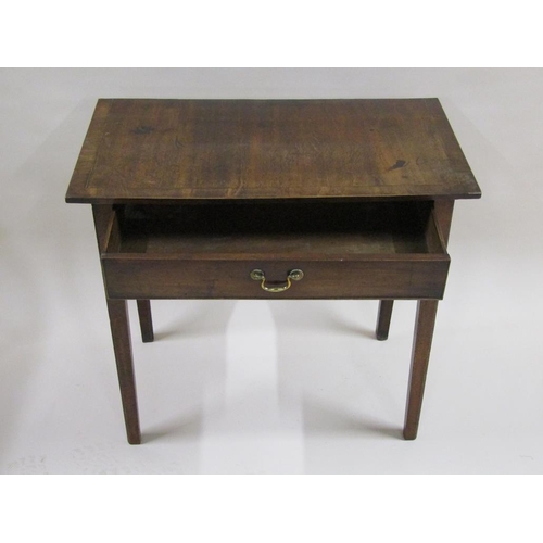 286 - A Georgian mahogany side table of rectangular form, with one long frieze drawer supported on square ... 