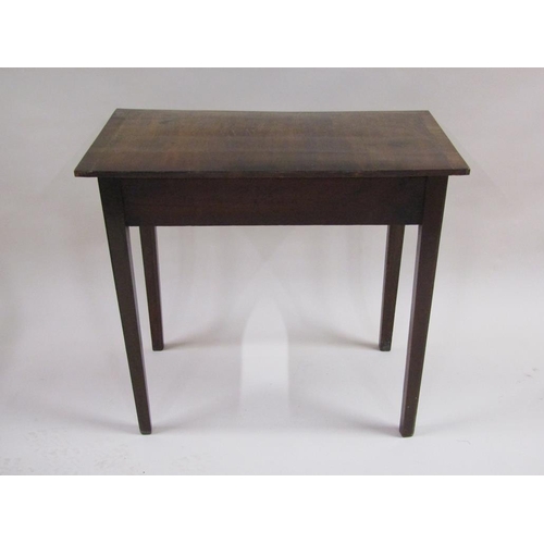 286 - A Georgian mahogany side table of rectangular form, with one long frieze drawer supported on square ... 