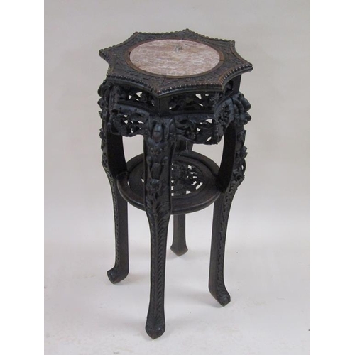 290 - A 19c Oriental carved hardwood marble top pot stand with and under tier shelf, a/f, 48cm w, 94cm h.