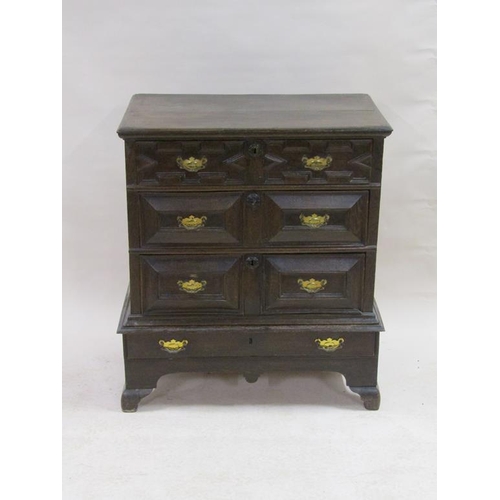 298 - A late 17c/early 18c oak geometric chest on a stand, the chest with three long drawers, the stand fi... 