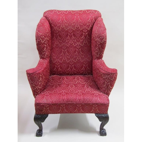 299 - A George III style mahogany framed and upholstered wing back armchair with splayed arms, with rear s... 