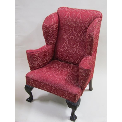 299 - A George III style mahogany framed and upholstered wing back armchair with splayed arms, with rear s... 