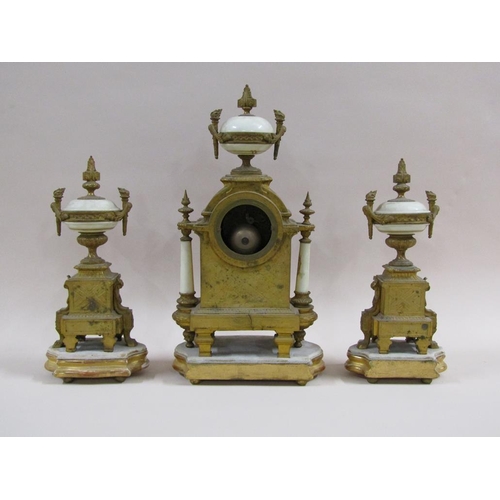 5 - A late 19c French garniture de cheminée comprising a central clock flanked by two urns.  The bodies ... 