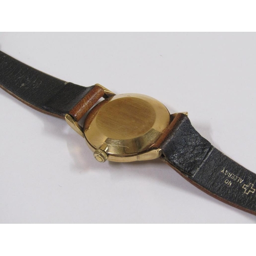 52 - A ladies Omega wristwatch with gold case movement and brown leather strap.