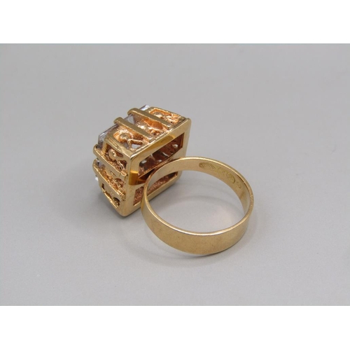 58 - An 18ct gold crystal set ring, size H.