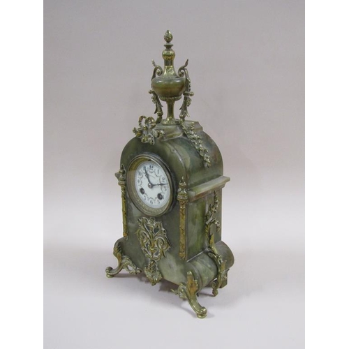 6 - A late 19c French mantel clock in green onyx case with cast gilt mounts.  The case has a rounded top... 