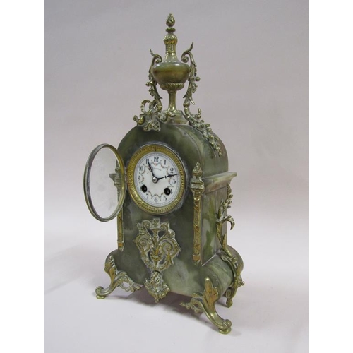 6 - A late 19c French mantel clock in green onyx case with cast gilt mounts.  The case has a rounded top... 