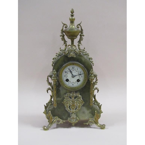 6 - A late 19c French mantel clock in green onyx case with cast gilt mounts.  The case has a rounded top... 