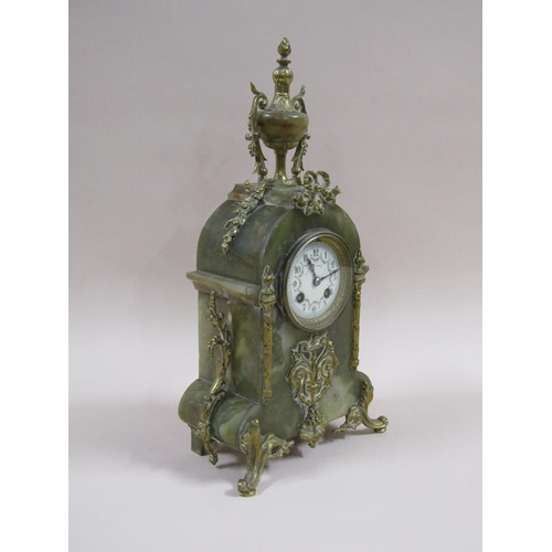 6 - A late 19c French mantel clock in green onyx case with cast gilt mounts.  The case has a rounded top... 