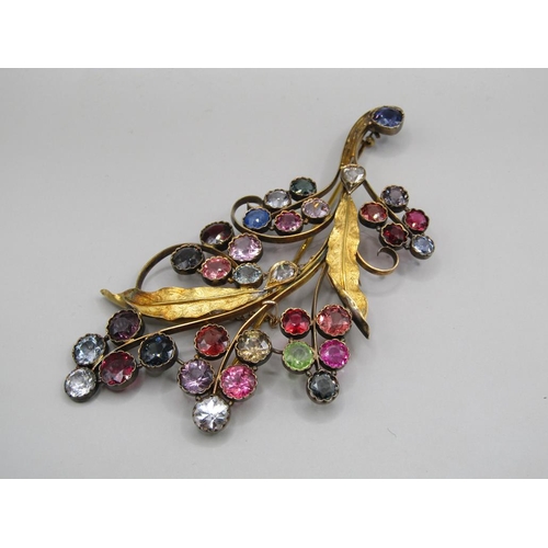 61 - An early 20c Continental gold multi stone set floral spray brooch, leaf stems mounted with teardrop ... 