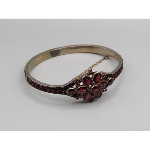 62 - An early 20c Silver garnet set mourning bracelet.