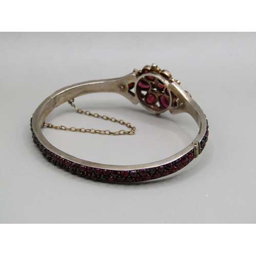 62 - An early 20c Silver garnet set mourning bracelet.