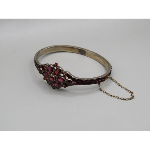 62 - An early 20c Silver garnet set mourning bracelet.