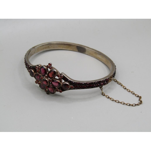 62 - An early 20c Silver garnet set mourning bracelet.