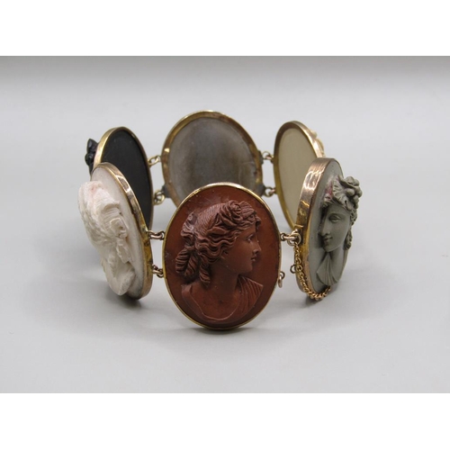 63 - A late 19c/early 20c gold coloured lava cameo bracelet, having six oval cameos of classical female h... 