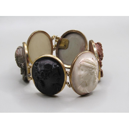 63 - A late 19c/early 20c gold coloured lava cameo bracelet, having six oval cameos of classical female h... 