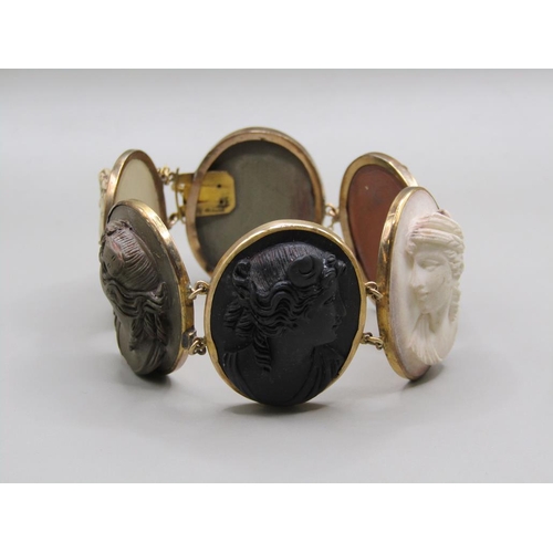 63 - A late 19c/early 20c gold coloured lava cameo bracelet, having six oval cameos of classical female h... 