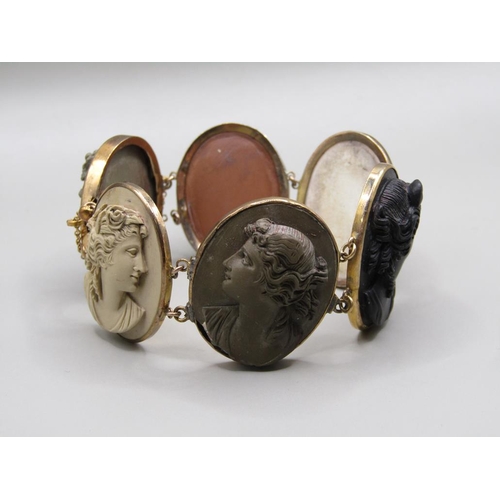 63 - A late 19c/early 20c gold coloured lava cameo bracelet, having six oval cameos of classical female h... 