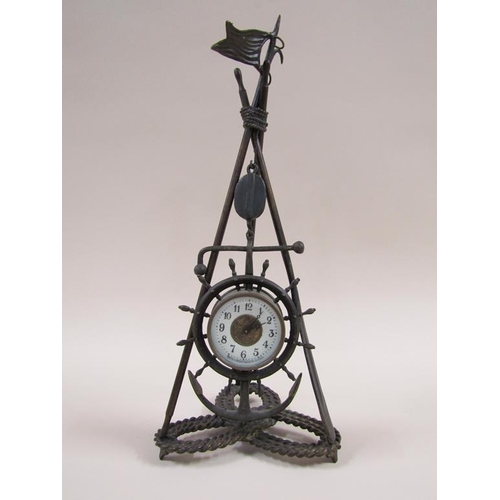 9 - A late 19c American novelty clock by Ansonia in the form of a small drum clock within a ships wheel ... 