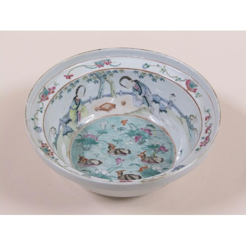 132 - A 19c Chinese famille verte bowl of deep circular form, the base decorated with ducks on a pool, the... 