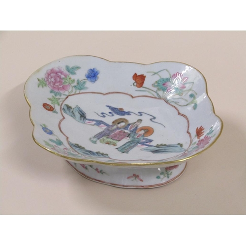 133 - A 19c Chinese famille rose comport of quatrefoil form, the bowl on an oval base and decorated with t... 