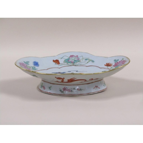 133 - A 19c Chinese famille rose comport of quatrefoil form, the bowl on an oval base and decorated with t... 