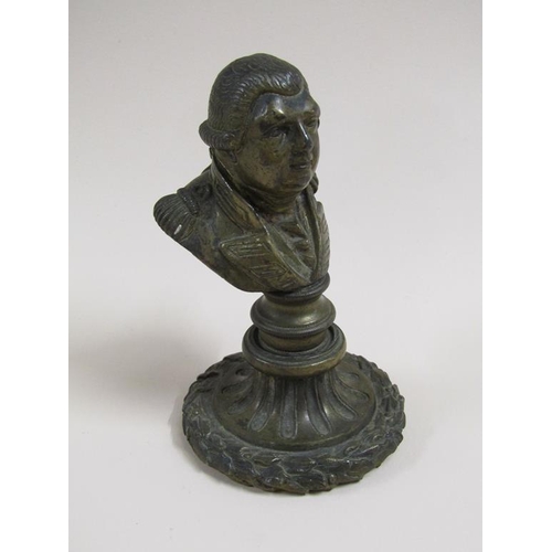 22 - A brass bust of King George III, 13cm h.