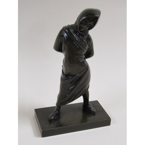 23 - A late 19c/early 20c patinated bronze figure of a young girl with hood and cloak, 17cm h.