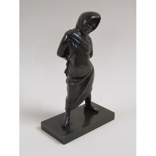 23 - A late 19c/early 20c patinated bronze figure of a young girl with hood and cloak, 17cm h.