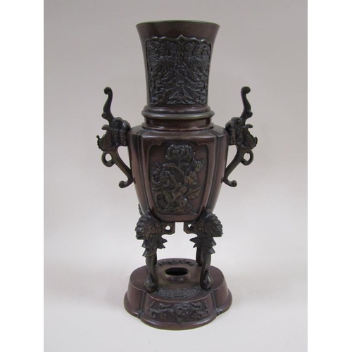 27 - A pair of late 19c Oriental patinated censer vases, two handled and having four legs supported on lo... 