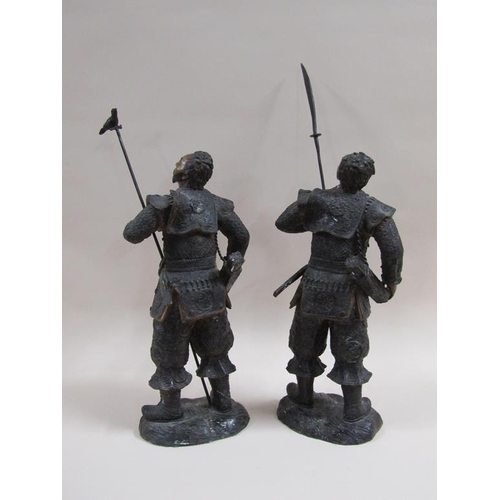 28 - A pair of early 20c patinated bronze Japanese warrior figures, cast in earlier period costume, one w... 