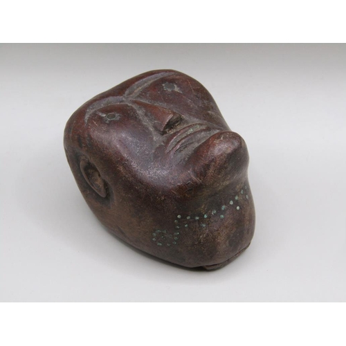 41 - A 19c carved wood snuff box in the form of a Polynesian head, the sliding cover and borders with pin... 