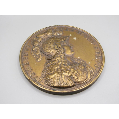 48 - A Louis XIV 'Sunking' gilt bronze medallion, dated 1674, 8cm diam.