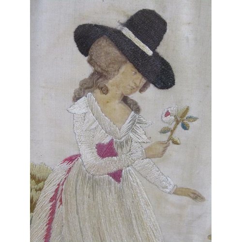 161 - An early 19c silk work and painted picture of a lady in a wide brim hat holding a rose, in a garden ... 