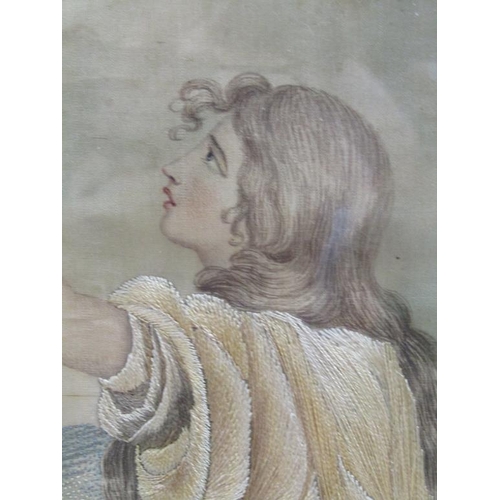 166 - A 19c silk work and watercolour picture of Ruth kneeling and offering up a prayer, oval framed and g... 