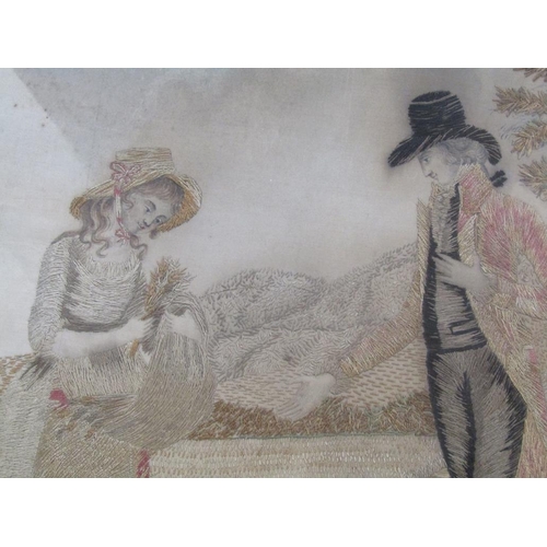 167 - An early 19c silk work picture of a lady and gentleman in a corn field, oval framed and glazed, 29cm... 