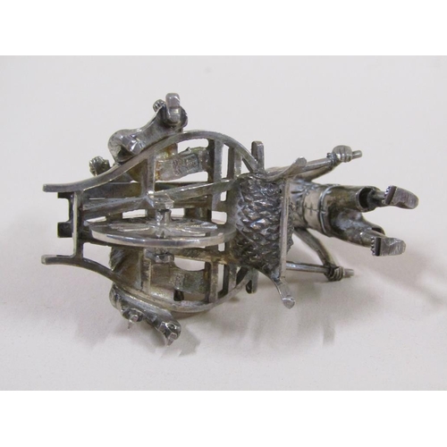 65 - A late 19c/early 20c group of three Chinese silver miniatures comprising a weaving loom, farmer cult... 