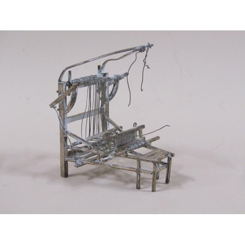 65 - A late 19c/early 20c group of three Chinese silver miniatures comprising a weaving loom, farmer cult... 